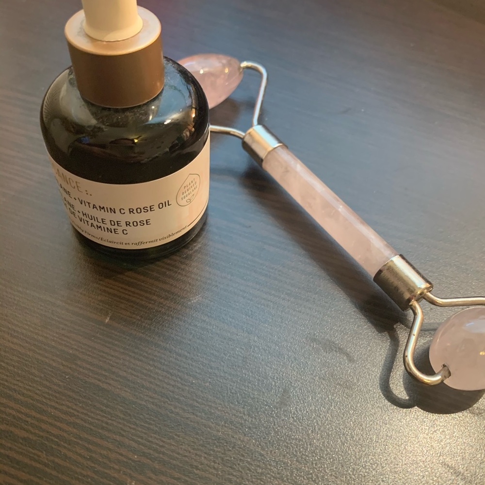 Biossance rose oil with rose quartz roller